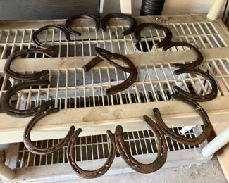 Metal art crafted from horseshoes