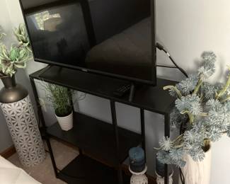 36" flat screen TV, black shelf