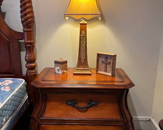 One of a pair of Chelsea House lamps and one of a pair of bombe bedside chests