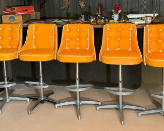 Chromcraft barstools in Big Orange color!