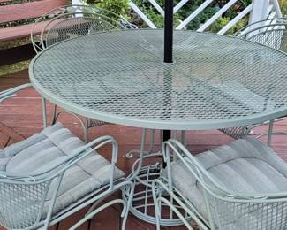 Painted metal outdoor patio set with umbrella