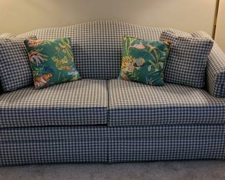 Sleeper sofa in blue check fabric with matching pillows, gently used