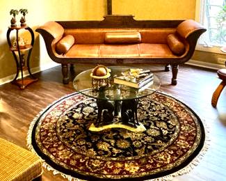 Leather sofa, Maitland SMith coffee table, Art Deco pieces, Carved lion head chairs....