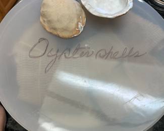 we have two sets of a dozen each of these glazed pottery oyster shells for grilling/broiling oysters!