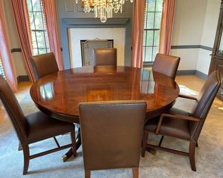 Large round Mahogany dining table and six chairs