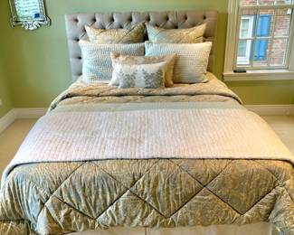 Queen bed with tufted headboard