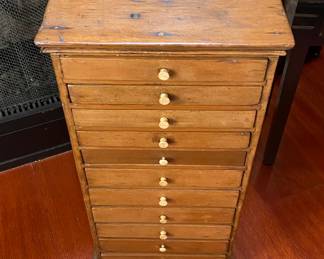 24" tall 11 drawer tea/painters cabinet 