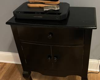 black table, black chest