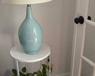 side table, table lamp, plant