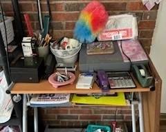 Typewriter and office supplies.