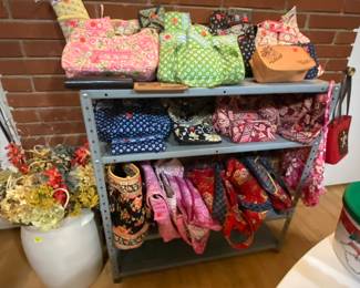 Various quilted bags, glass cases and wallets, mostly Vera Bradley retired patterns