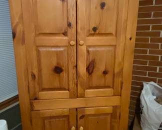 Pine hutch with shelves inside.