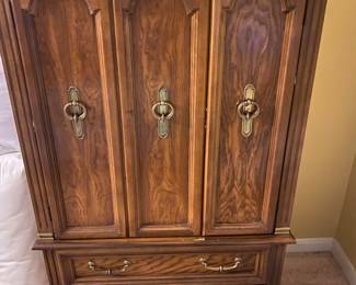 Armoire with shelves and drawers inside. Part of a 4 piece king suite.
