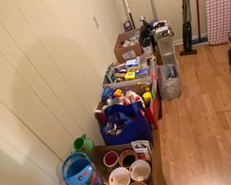 Garden tools, pots, lightbulbs, cleaning products, first aid items, vacuum, Swiffer, ironing boards, mini-fridge, mops, extension cords, etc.