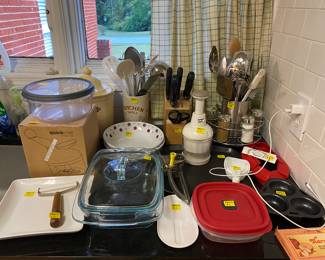 Various kitchen tools, gadgets, dishes and knives