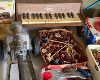 Vintage Roller Skates and Plastic Cannon