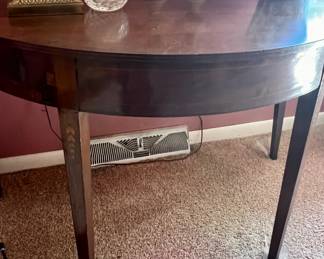 Half-moon shaped accent table