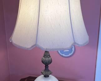 Hollywood Regency style lamps with brass floral and leaf accents