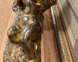 Joseph D'Aste (French/Italian, 1881-1945) Cast bronze sculpture, Satyr with cherub lying down, circa early 20th century, signed J D'Aste.
