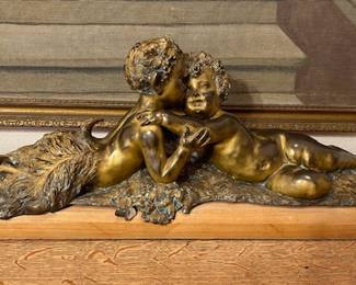 Joseph D'Aste (French/Italian, 1881-1945) Cast bronze sculpture, Satyr with cherub lying down, circa early 20th century, signed J D'Aste.