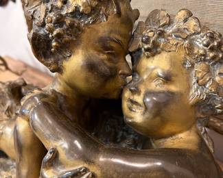 Joseph D'Aste (French/Italian, 1881-1945) Cast bronze sculpture, Satyr with cherub lying down, circa early 20th century, signed J D'Aste.