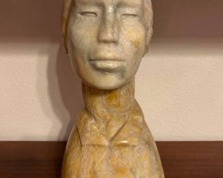 Evelyn Fredericks (1948 -2021) Portrait bust, carved from Utah alabaster quarry north of Cedar City, 13 1/2 x 16 1/2 inches, provenance note from the artist, signed.