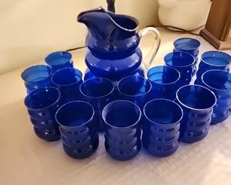 Vintage Louie glass pitcher with 6 glasses and a 10 piece set of just glasses