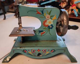 Vintage childs sewing machine,  mini