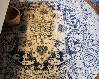 Round blue and white rug