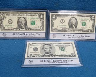 Lot 102. Slabbed $1, $2, and $5 Star Notes