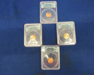 Lot 184. "First Day of Issue" Lincoln Penny Bicentennial set with all four design themes slabbed by ANACS