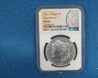 Lot 42. 2021 S 100th Anniversary Early Release Morgan Sliver Dollar graded by NGC MS69
