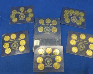 Lot 167. 41 Gold-Colored Presidential Non-Monetary Coins and New Album