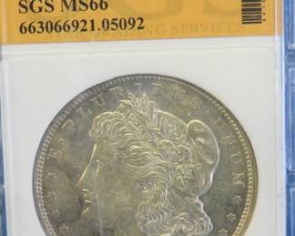 Lot 80. 1921 D SGS certified encased Morgan Silver Dollar