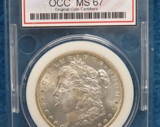 Lot 93. 1884 O Morgan Silver Dollar graded MS 67 by OCC