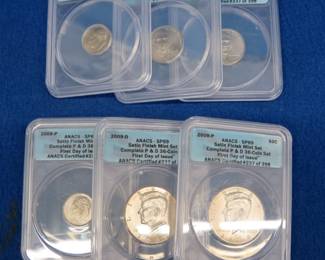 Lot 188. Six "First Day of Issue" 2009 D and P coins slabbed by ANACS Two 2009 Kennedy Half Dollars Two Roosevelt Dimes Two Jefferson Nickels
