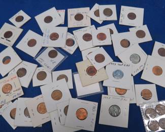 Lot 279. 45{+} slabbed Lincoln Pennies with 10 older than 1930 with dates provided prior to consignment