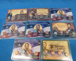 Lot 121. Eight Lincoln Penny sets: Four 100th Anniversary "The Changing Lincoln Cent Set" and Four "Ultimate Lincoln Anniversary Cents" Set