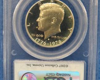Lot 141. 1976 S Bicentennial Half Dollar slabbed and graded Gem Proof by PCGS