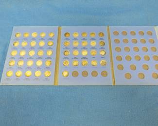 Lot 134. Roosevelt Dime album beginning in 1946 and ending in 1963 containing 46 silver dimes