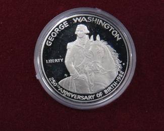 Lot 284. Two Commemorative Silver George Washington coins Both coins are 90% (.3617 troy oz.) fine silver