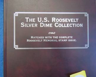 Lot 70. 19 Silver Dimes in a Postal Commemorative Album called " The U.S. Roosevelt Silver Dime Collection." One each from 1946 through 1964.