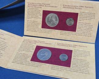 Lot 295. Two Thomas Jefferson Coinage and Currency Sets each with a 90% Silver Dollar , $2 bill and Jefferson Nickel