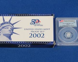 Lot 229. 2002 U.S. Mint Proof Set which also includes five State Quarters; and one First Strike 2016 S Roosevelt Dime slabbed and graded PR70 DCAM by PCGS