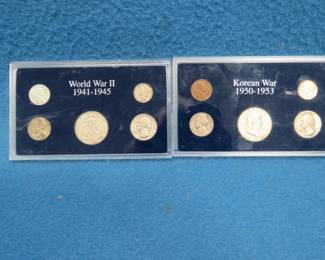 Lot 44. Two encased coin collections "Korean War 1950-1953" and "World War II 1941-1945."