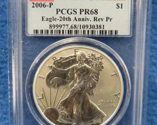 Lot 136. 2006 P First Strike Silver Eagle-20th Anniv. Rev. Pr graded PR68 by PCGS