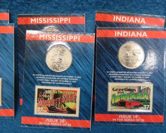 Lot 256. Ten State Quarters on cards that include the State Postage Stamp
