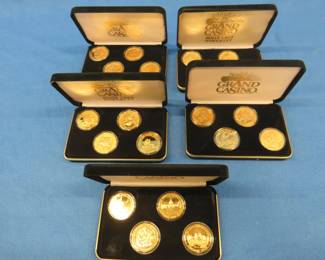 Lot 163. Five felt cases each with four Grand Casino coins