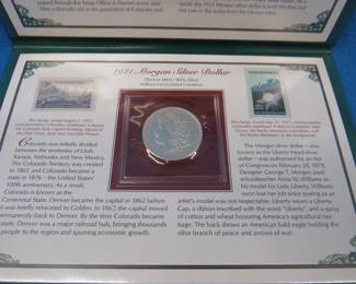 Lot 133. 1921 D Morgan Silver Dollar in a folder from the Postal Commemorative Society