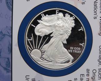 Lot 254. "Making American History 2012" set including a 2012 S Silver Eagle and a 2009 $5 Note from the Federal Reserve Bank of San Francisco